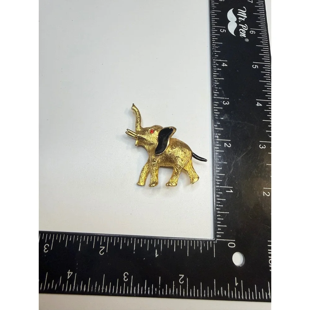 Gold Tone Elephant Brooch Red Rhinestone Eye Black Enamel Textured Animal Pin